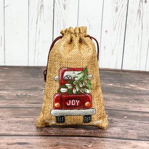 Joy truck with tree burlap bag